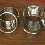Replacement ball bearing races for farm tractors.